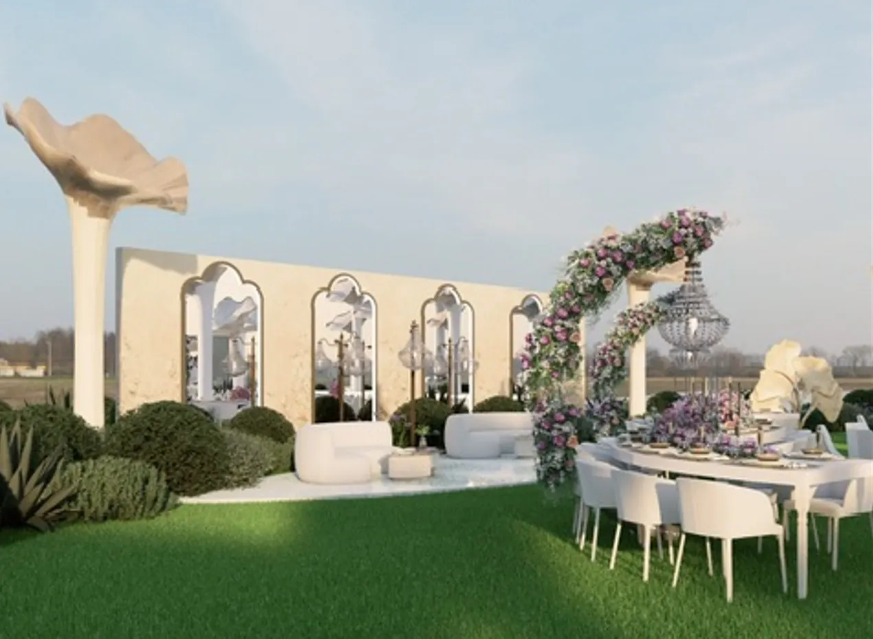 Garden wedding with floral arch, sculptural flower columns and dining table, Al Shamkha, Abu Dhabi